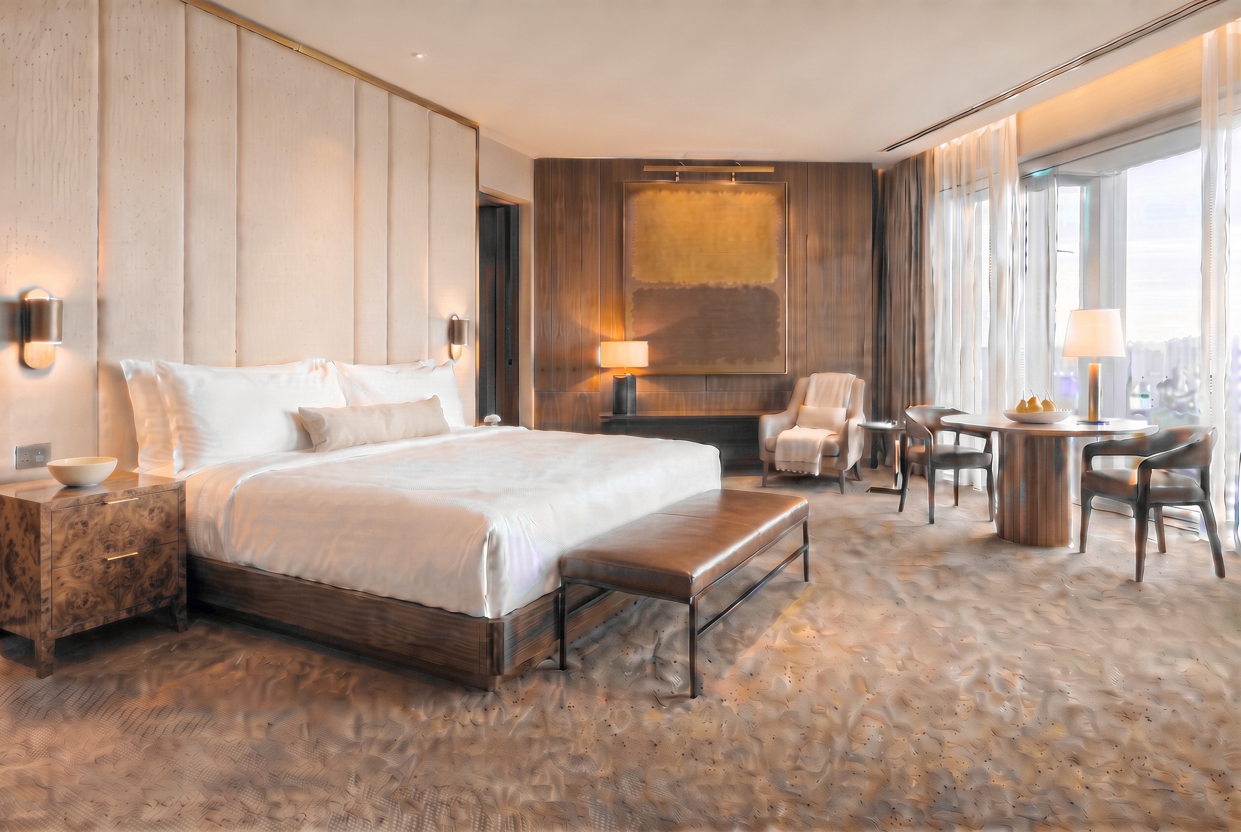 Modern luxury hotel suite fully appointed with custom casegoods, upholstery, lighting, and art